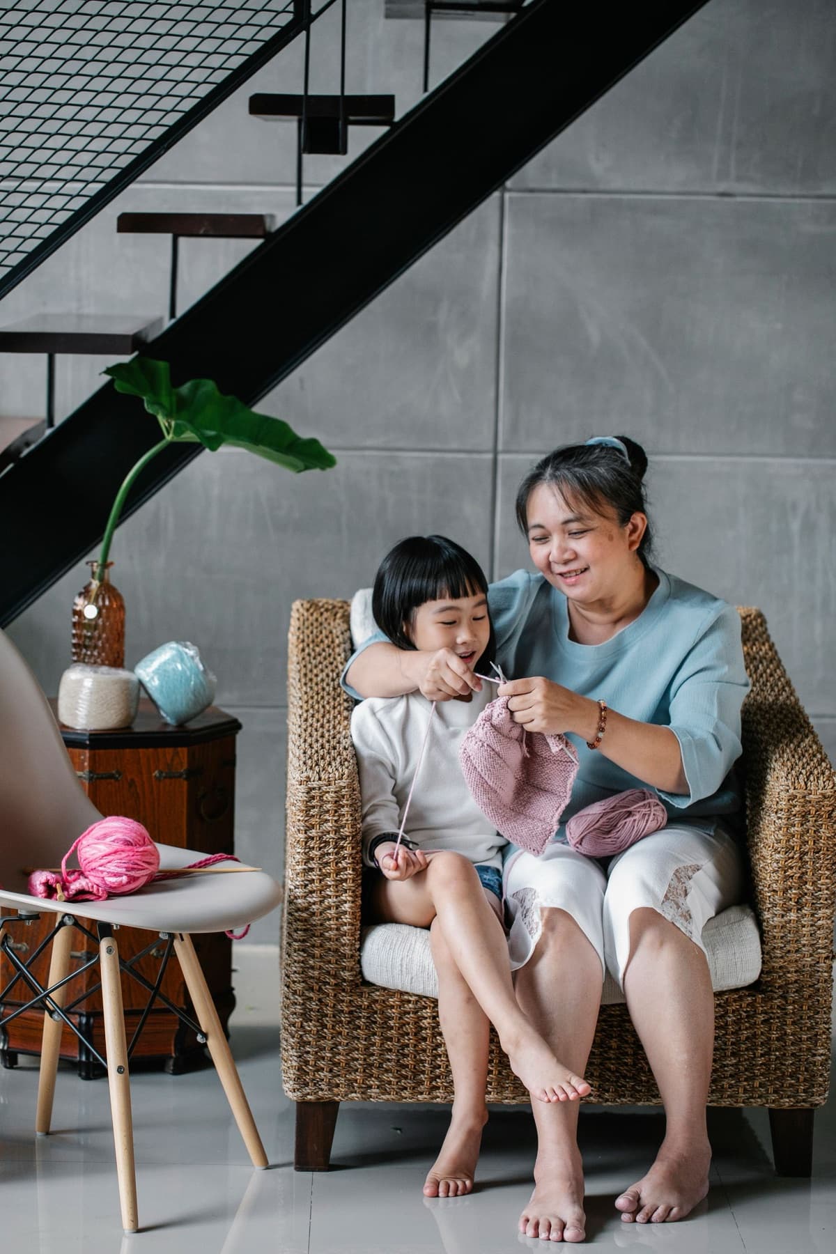 A grandmother and child sharing a quiet moment at home in Singapore
