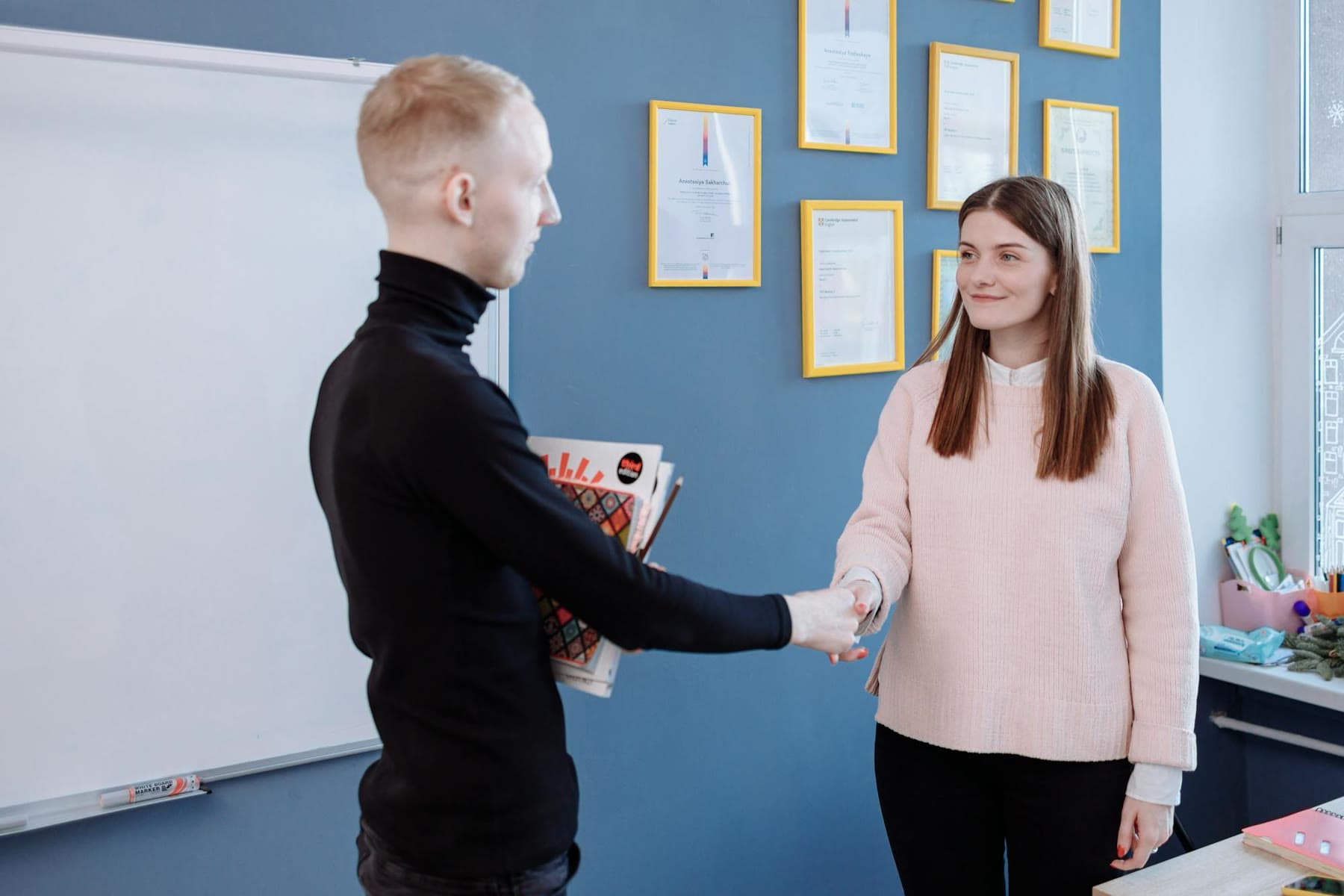A warm, professional consultation between a ZE consultant and a client